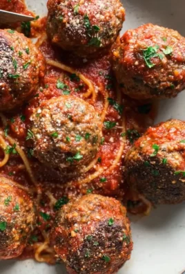 Delicious baked Italian meatballs served in a tomato sauce