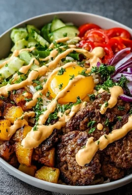 Delicious burger bowls topped with fresh veggies and sauces.