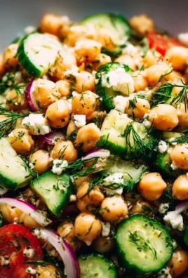 Bright and colorful chickpea cucumber salad with fresh vegetables