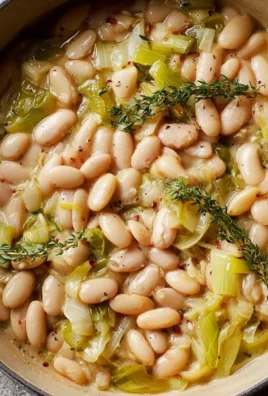 Creamy butter beans with leeks served in a bowl