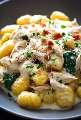 Creamy Crack Chicken Gnocchi served in a bowl with herbs