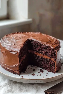 Delicious homemade Hershey Chocolate Cake topped with chocolate frosting