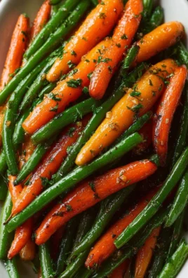 Honey glazed carrots and green beans served in a bowl, ready to enjoy.