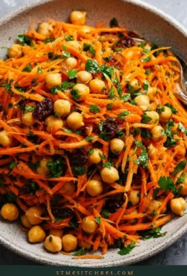Moroccan Carrot and Chickpea Salad with vegetables in a bowl