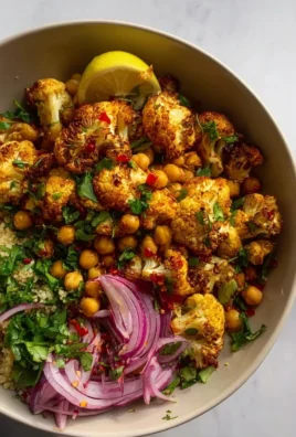 Roasted cauliflower salad with tahini, chickpeas, and pearl couscous