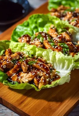 Delicious Teriyaki Chicken Lettuce Wraps served in a bowl with fresh ingredients