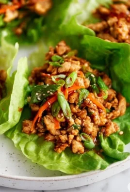 Thai Chicken Lettuce Wraps with fresh ingredients and vibrant flavors