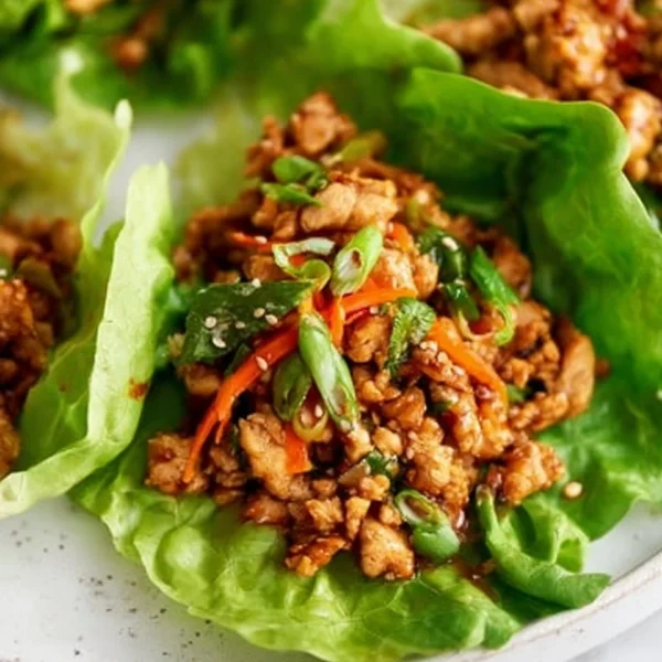 Thai Chicken Lettuce Wraps with fresh ingredients and vibrant flavors