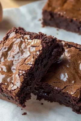 A plate of the BEST chewy brownies, rich and fudgy, ideal for dessert enthusiasts.