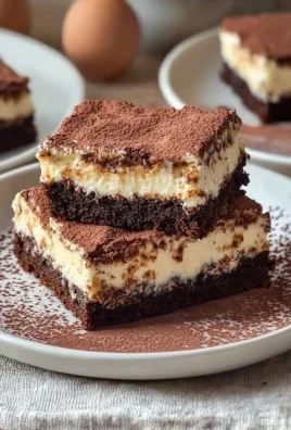 Decadent tiramisu brownies with layers of chocolate and coffee flavors.