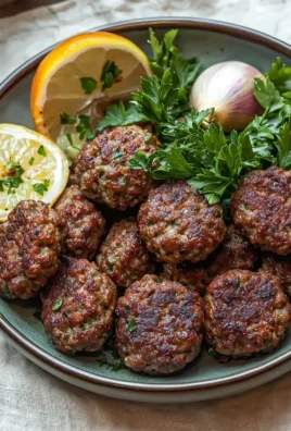 Delicious Turkish meatballs served on a plate with herbs and spices