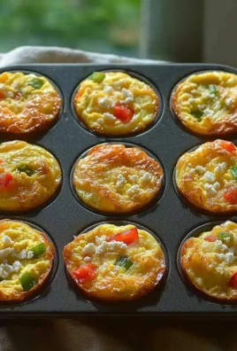 Delicious breakfast egg muffins with vegetables and cheese