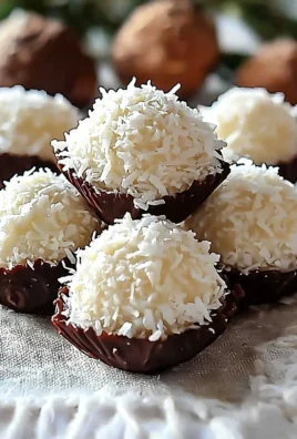 Delicious coconut cream truffles for holiday treats and no-bake candy recipes.
