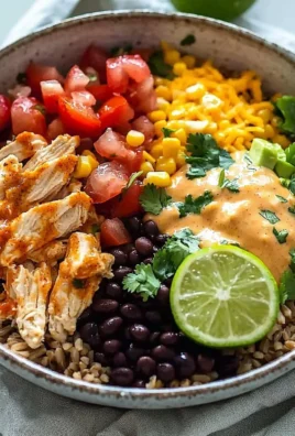 Delicious Easy Southwest Chicken Burrito Bowls topped with fresh ingredients