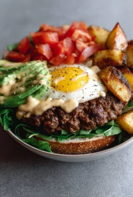Healthy high-protein burger with fresh ingredients on a plate