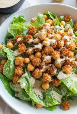 Simple Romaine Caesar Salad topped with crispy chickpea croutons