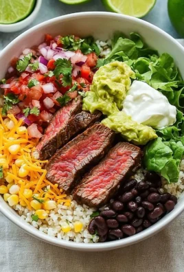 Homemade steak burrito bowl inspired by Chipotle, filled with steak and fresh ingredients.
