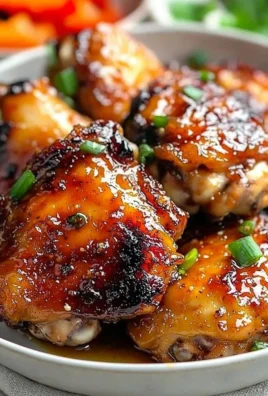 Sticky sweet chili chicken thighs cooked in an air fryer for a tasty meal