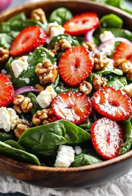Delicious strawberry spinach salad with fresh ingredients and vibrant colors