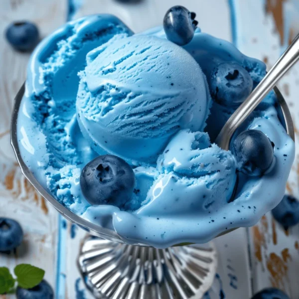 Delicious homemade Blue Moon Ice Cream in a bowl with sprinkles
