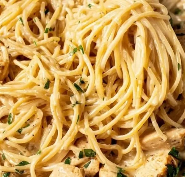 Delicious Easy Garlic Chicken Pasta served in a bowl with fresh herbs
