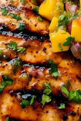 Honey Lime Chicken served with Mango Salsa on a plate