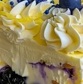 No-Bake Lemon Blueberry Cream Cake with fresh blueberries and lemon zest