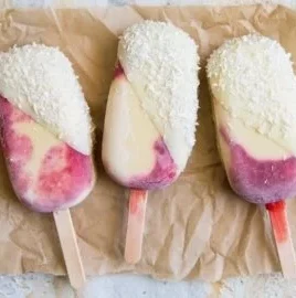 Delicious Raspberry Mango Coconut Pops with vibrant colors and tropical flavors.