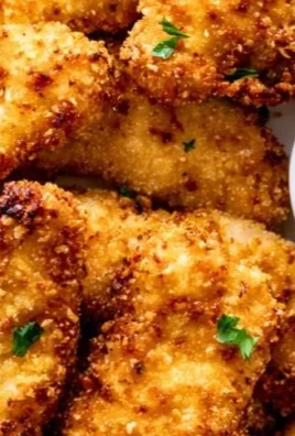 Crispy air fryer chicken tenders served with dipping sauce