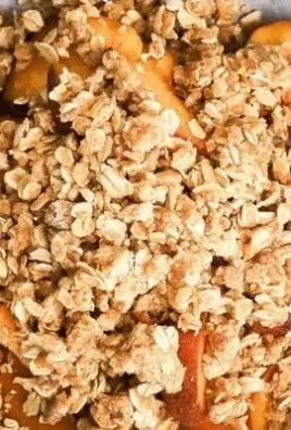 Delicious Air Fryer Peach Crisp served in a bowl with cinnamon topping