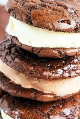Decadent brownie cookie ice cream sandwiches with chocolate and vanilla flavors