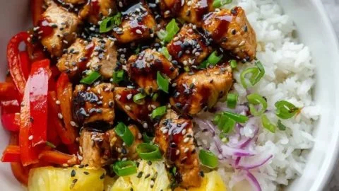 Delicious Hawaiian Chicken Bowl featuring glossy teriyaki sauce and fresh pineapple