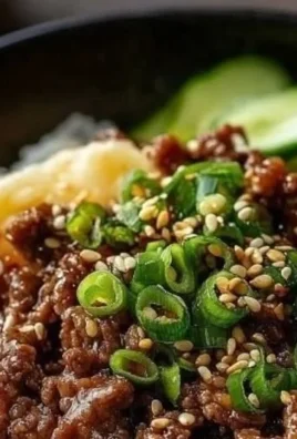 A flavorful Korean Beef Bowl with tender beef, vegetables, and rice served in a vibrant dish.
