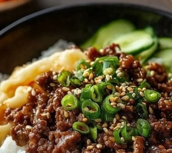 A flavorful Korean Beef Bowl with tender beef, vegetables, and rice served in a vibrant dish.