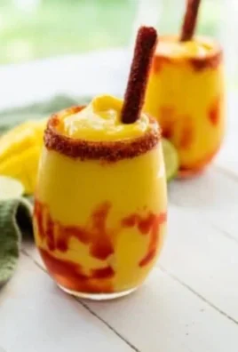 Refreshing Mexican Mangonada made with mango, chamoy, and chili powder