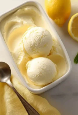 Ninja Creami Lemon Gelato bowl with fresh lemon slices