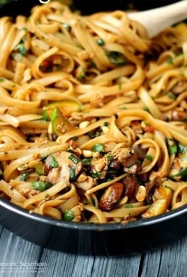 Delicious one pot spicy Thai noodles with vibrant colors and ingredients.