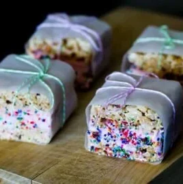 Delicious Rice Krispie Treat Ice Cream Sandwiches served on a plate