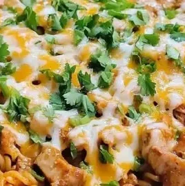 Delicious bowl of Korean spicy chicken noodles served with vegetables