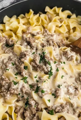 30-minute ground beef stroganoff served in a bowl with mushrooms and noodles