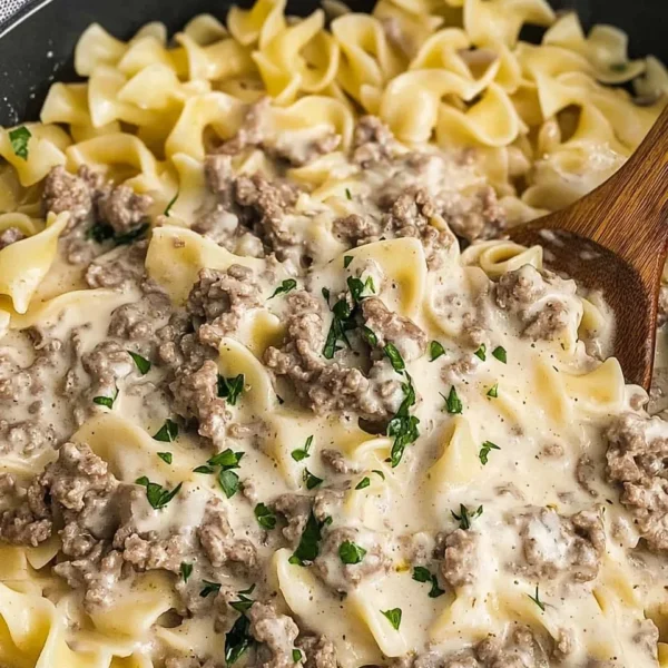 30-minute ground beef stroganoff served in a bowl with mushrooms and noodles