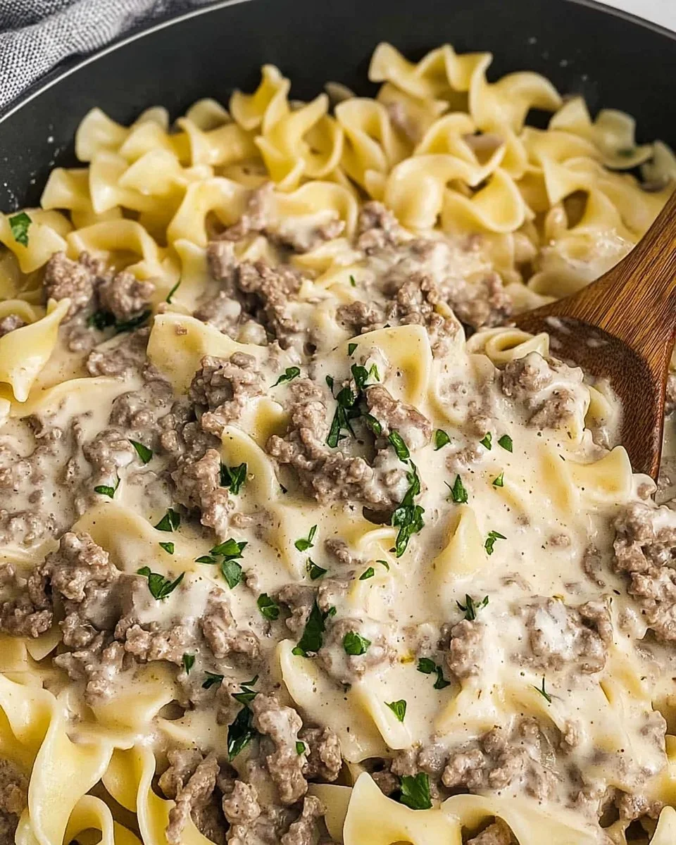 30-minute ground beef stroganoff served in a bowl with mushrooms and noodles