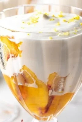 Delicious no-bake peaches and cream dessert with fresh peaches and whipped cream