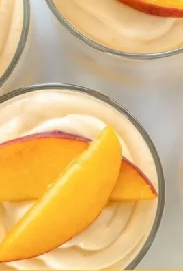Delicious Summer Peach Mousse Trifles served in elegant glasses